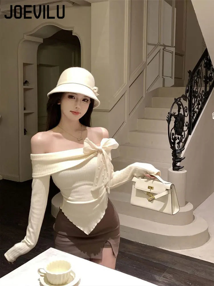 HAUT SLIM A NOEUD -EPAULES DENUDEES CHIC ET RETRO