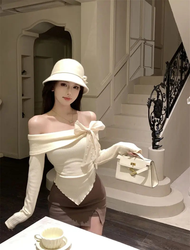 HAUT SLIM A NOEUD -EPAULES DENUDEES CHIC ET RETRO
