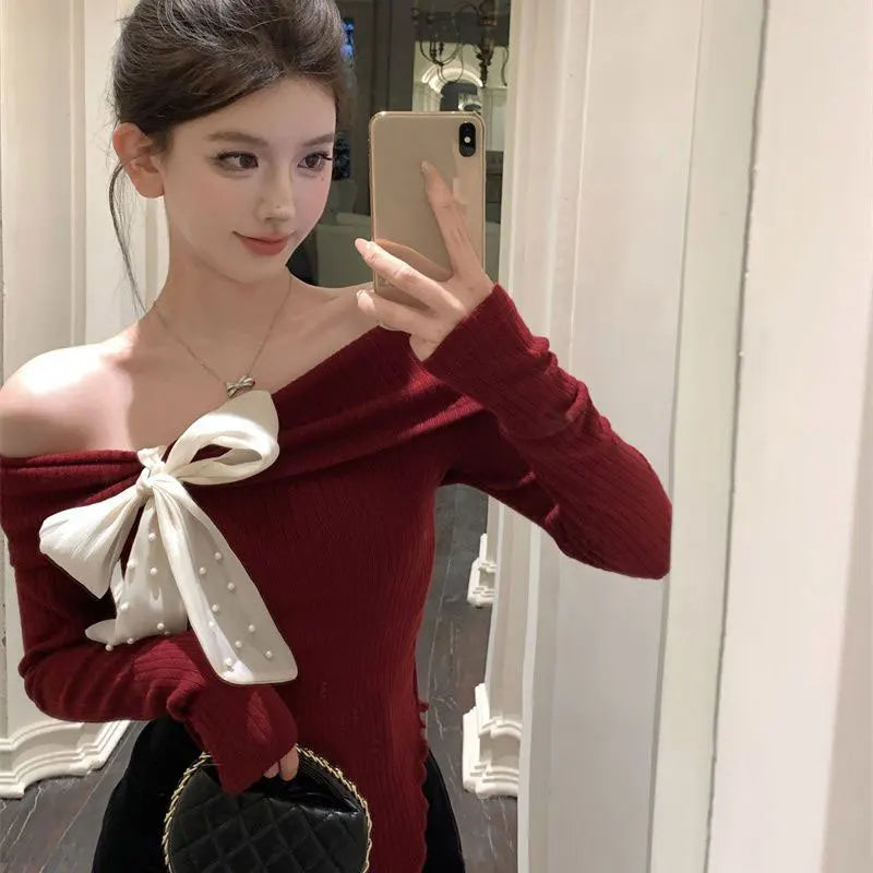 HAUT SLIM A NOEUD -EPAULES DENUDEES CHIC ET RETRO