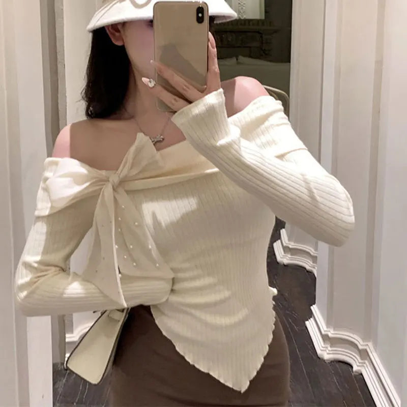 HAUT SLIM A NOEUD -EPAULES DENUDEES CHIC ET RETRO
