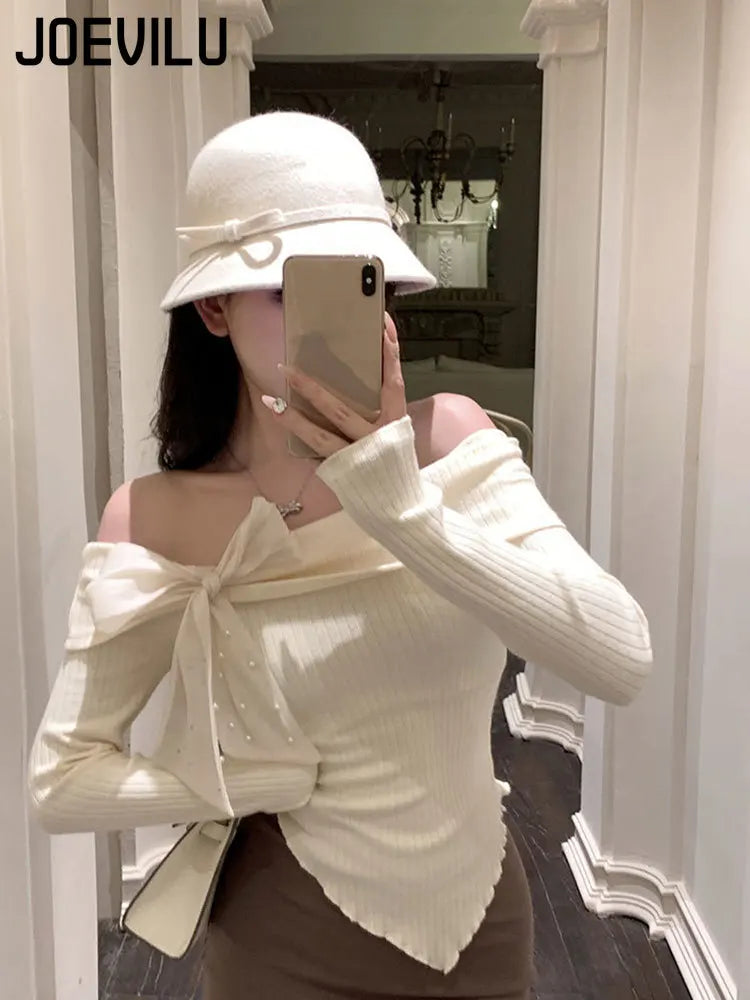 HAUT SLIM A NOEUD -EPAULES DENUDEES CHIC ET RETRO