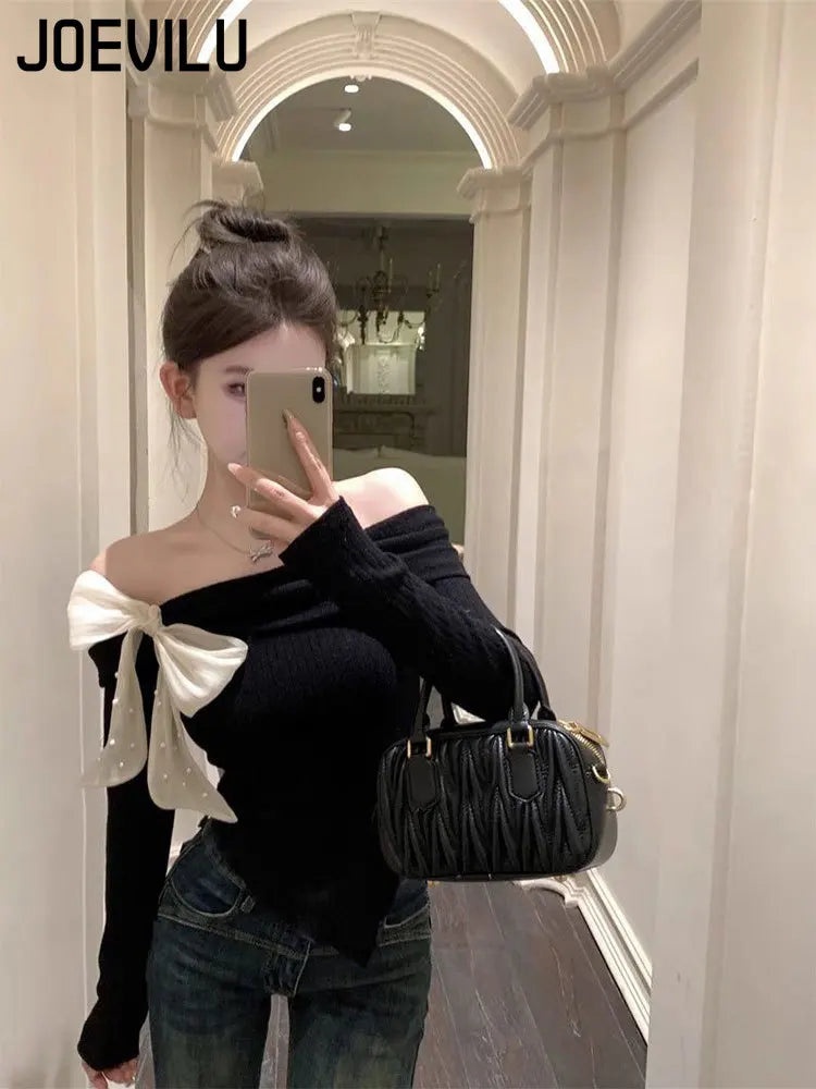 HAUT SLIM A NOEUD -EPAULES DENUDEES CHIC ET RETRO