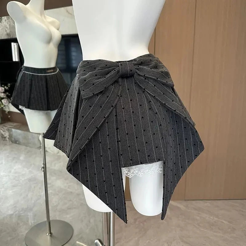 JUPE PLISSEE A NOEUD EN DENTELLE
