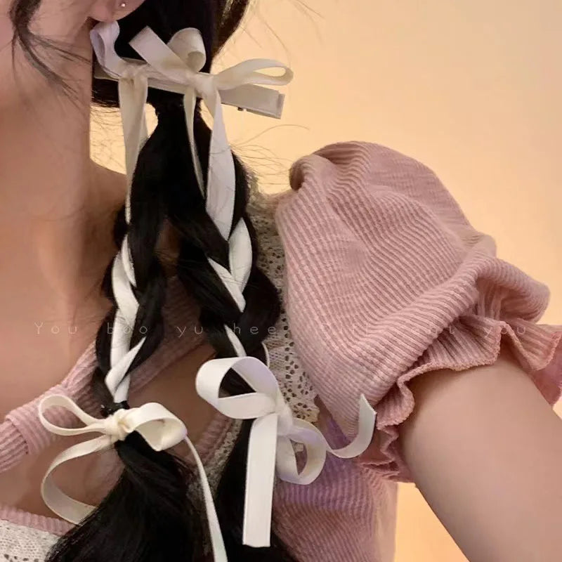2 PINCES A CHEVEUX A LONGS RUBANS