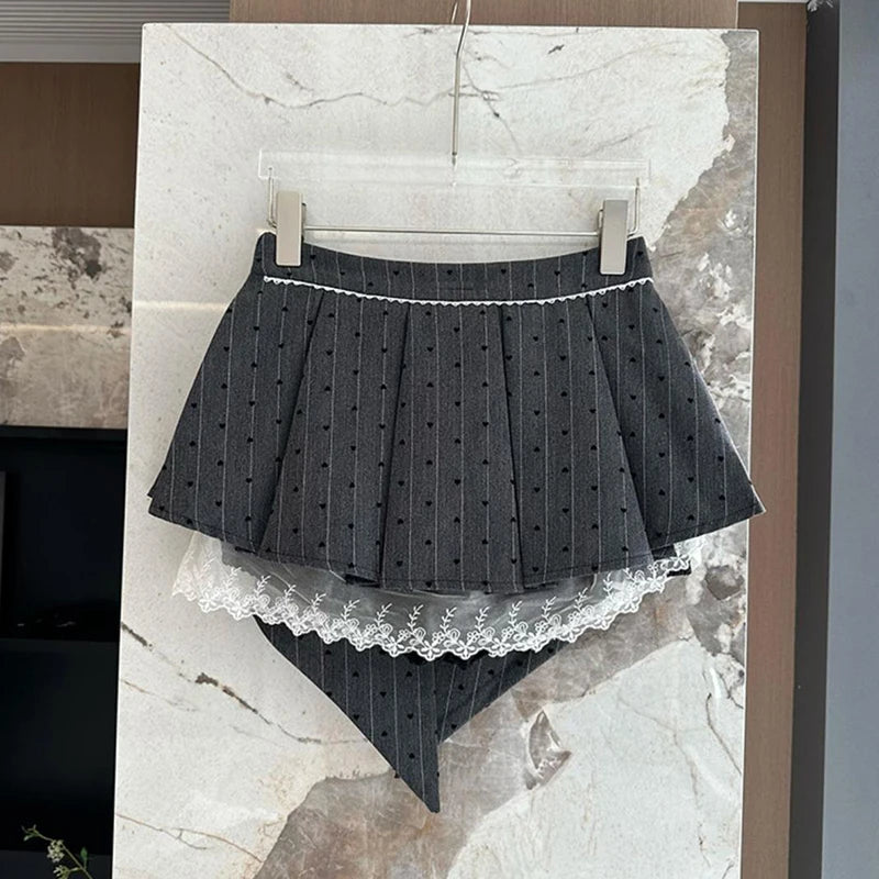 JUPE PLISSEE A NOEUD EN DENTELLE